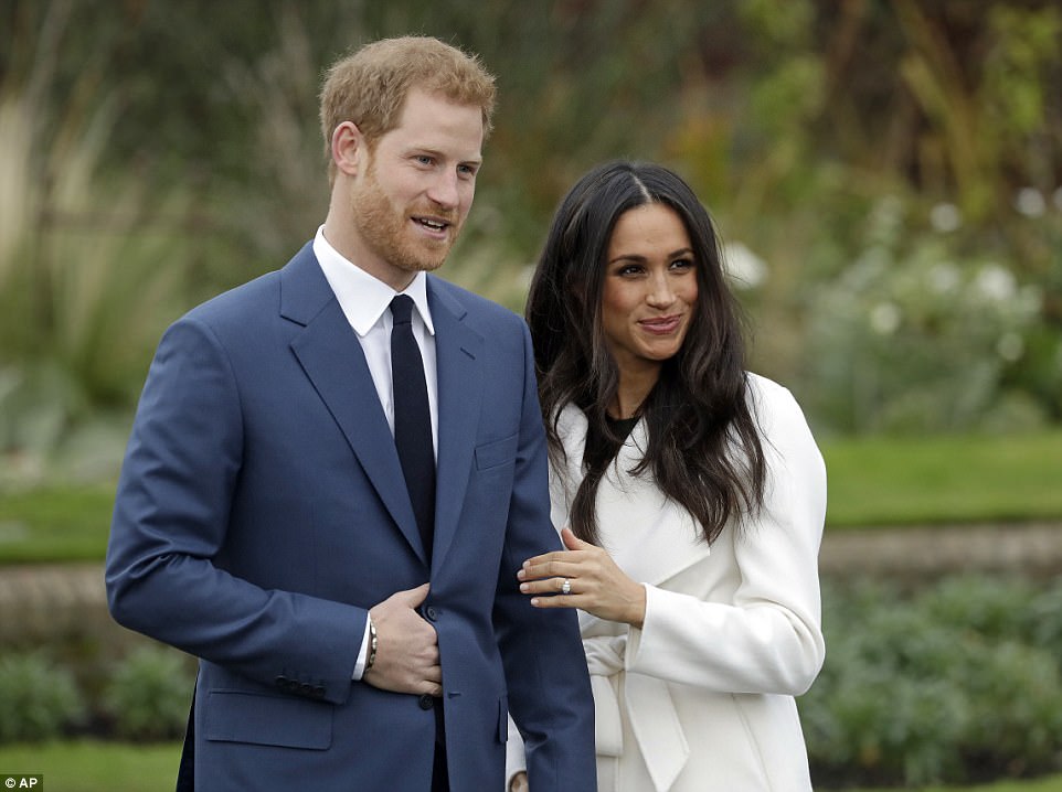 46BCFF0300000578 5126431 Prince Harry and Meghan Markle appeared at a photocall at London a 1 1511942875860